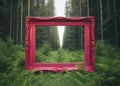 Rustic pink frame in the middle of the forest. Tamed nature conceptual background.