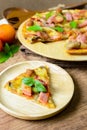 Rustic pizza with becon, salami, mozzarella and basil Royalty Free Stock Photo