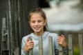 Rustic portrait of a cute happy teenage girl