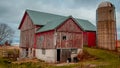 Rustic Red Barn with Silo in Wisconsin Royalty Free Stock Photo