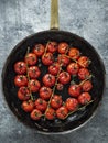 Rustic roasted red summer cherry tomato Royalty Free Stock Photo