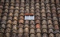 The texture of the old, variegated tiles on the roof of a building Royalty Free Stock Photo