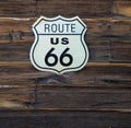 Rustic Route 66 sign on wooden board