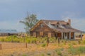 A rustic, rundown, old abandoned, ruined, farm house in the countryside of a prairie in Colorado Royalty Free Stock Photo