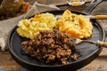 Rustic serving of haggis, neeps and tatties