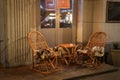 Rustic Sidewalk Cafe with Wooden Tables Royalty Free Stock Photo