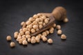 Rustic slate slab with dried Chickpeas, selective focus