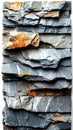 Rustic Slate Stone Tile Wall Texture in Gray and Orange Hues Royalty Free Stock Photo