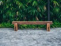 Rustic solid railway sleeper wooden bench on concrete floor