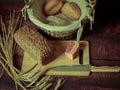 Rustic still life in antique style with bread, ears of wheat . Royalty Free Stock Photo