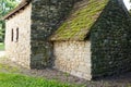 Rustic stone building with a moss-covered roof set in Reichenau, Germany Royalty Free Stock Photo