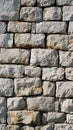 Rustic Stone Wall Texture. Background of Gray and Beige Stones Royalty Free Stock Photo