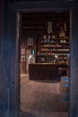 Rustic storefront with a weathered wooden floor.