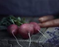 Rustic style. Fresh Radishes on the wooden table.