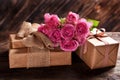 Rustic style gift boxes and pink roses