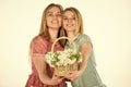 Rustic style girls gathering flowers together. Flowers shop. Natural fragrance. Friendship and love. Women and flowers