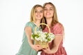 Rustic style girls gathering flowers together. Flowers shop. Natural fragrance. Friendship and love. Women and flowers