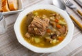 Rustic style pearl barley mushroom soup with pork and vegetables Royalty Free Stock Photo