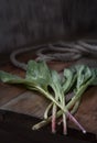 Rustic style. Wild garlic on the wooden table.