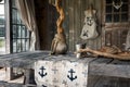 rustic table with anchorimprinted table runner, ropewrapped vase, and driftwood accents Royalty Free Stock Photo