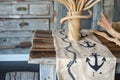 rustic table with anchorimprinted table runner, ropewrapped vase, and driftwood accents Royalty Free Stock Photo