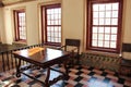 Rustic table and chair in a sunlit room