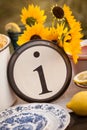 Rustic table setting with lettered plate. Royalty Free Stock Photo