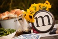 Rustic table setting with lettered plate. Royalty Free Stock Photo
