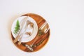 rustic table setting in natural forest style with wild ferns, wooden details and soft woodland tones. Royalty Free Stock Photo