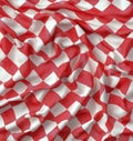 This rustic tablecloth is adorned with a red and white checkered design. Royalty Free Stock Photo