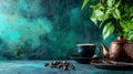 Rustic tea setup with a teapot and coffee beans against a textured background Royalty Free Stock Photo
