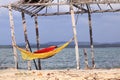 Rustic tent with hammock inside the beach. Deserted beach of Mangue Seco; Jandaira; Bahia; Brazil