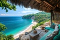 Rustic terrace overlooking tropical bay with lush cliffs and sandy beach below Royalty Free Stock Photo