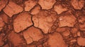 Rustic texture of cracked dark brown mud wall for earthy design inspiration Royalty Free Stock Photo