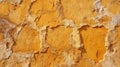 Rustic textured orange plaster wall with peeling paint patterns Royalty Free Stock Photo