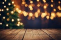 Rustic Wooden Table with Festive Christmas Lights Bokeh Background Royalty Free Stock Photo