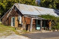 Rustic Tin Roof Cabin With Wood Log Siding Royalty Free Stock Photo