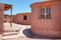 A rustic town in the desert with adobe round houses