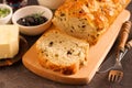 Rustic traditional olives and spring onion bread, close up