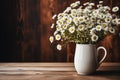 Rustic vase, white coffee mug mockup with chamomile bouquet Royalty Free Stock Photo