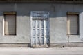 Rustic very old dilapidated vintage abandoned suburban family house entrance doors in need of restoration