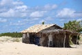 Rustic and very poor house on the beach. Poor fisherman`s house. Rustic wattle and daub and adobe construction