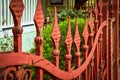 Ornate antique Victorian iron metal garden fence Royalty Free Stock Photo