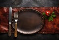 Rustic vintage set of cutlery knife, spoon, fork. Black background. Top view. Created with Generative AI technology. Royalty Free Stock Photo