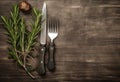 Rustic vintage set of cutlery knife, spoon, fork. Black background. Top view. Created with Generative AI technology. Royalty Free Stock Photo