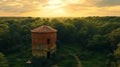 Rustic water tower sunset forest aerial landscape Royalty Free Stock Photo