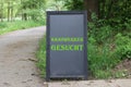 A rustic, weathered old vintage school blackboard with the words Handyman Wanted