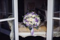 Wedding bouquet bride is standing on a sofa Royalty Free Stock Photo