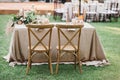 Rustic wedding set, vintage dining table with decorations, flowers, boho style, event, party or wedding Royalty Free Stock Photo