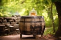 rustic whisky barrel on a wooden table outdoors